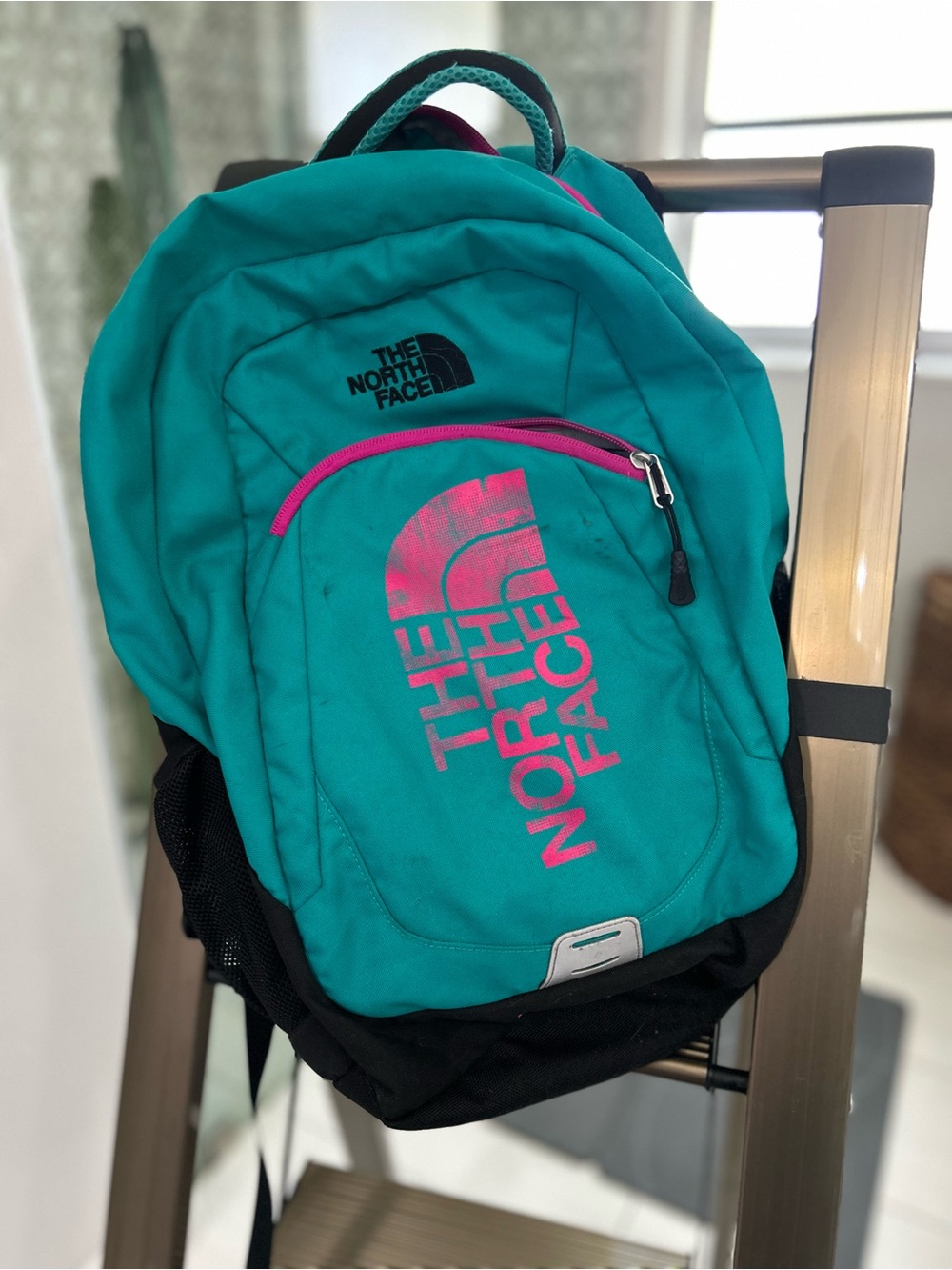 The North Face Teal Backpack with Pink Accents